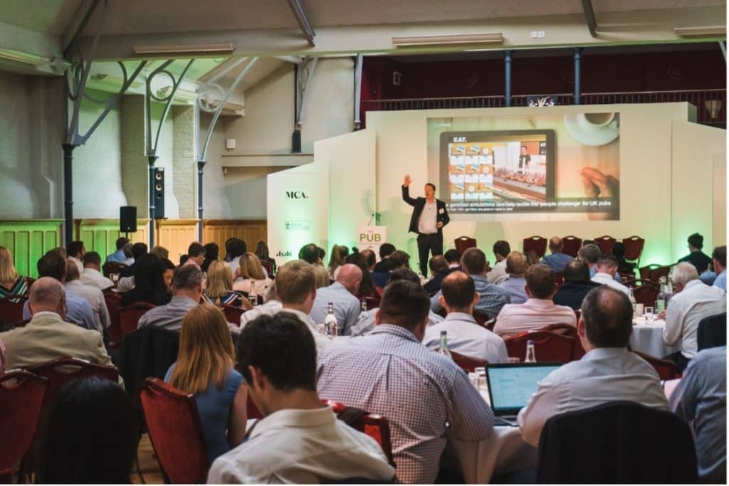 Krister Kristiansen on stage, Attensi's expansion